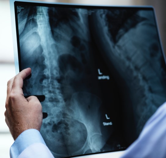 Doctor scanning xray to upload into appointment booking software